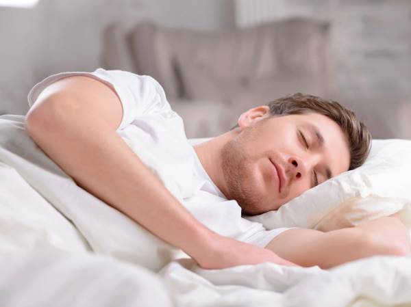 bigstock-Handsome-sleeps-in-his-bed-107391704